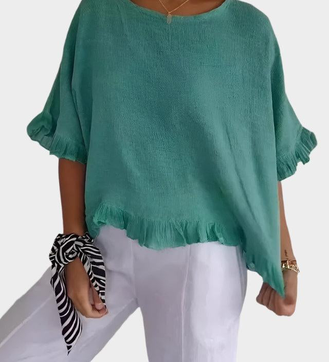 Top leggero in lino con volant e arricciature