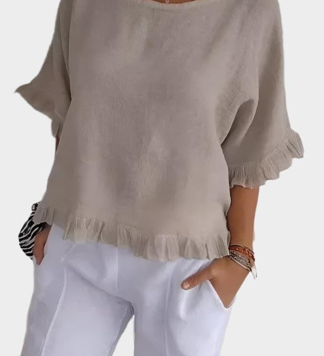 Top leggero in lino con volant e arricciature