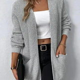 Růžový otevřený svetr