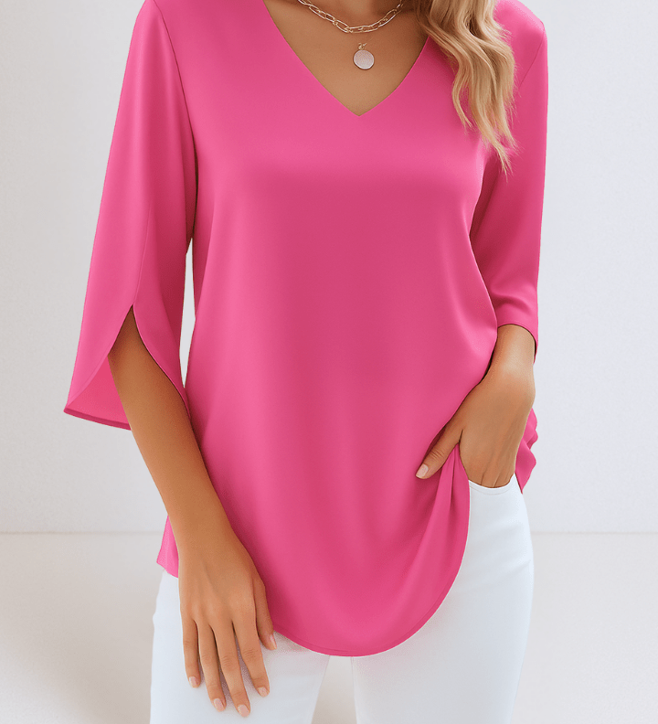 Top elegante con scollo a V e maniche aperte