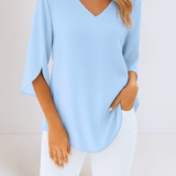 Top elegante con scollo a V e maniche aperte